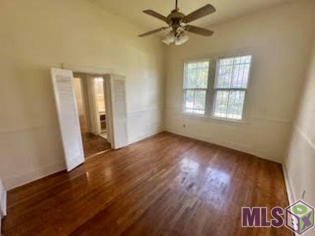 1023 Laurel Street Baton Rouge, LA 70802 - Photo 19 of 23 Side apartment - Bedroom with 12' ceiings original wood floors