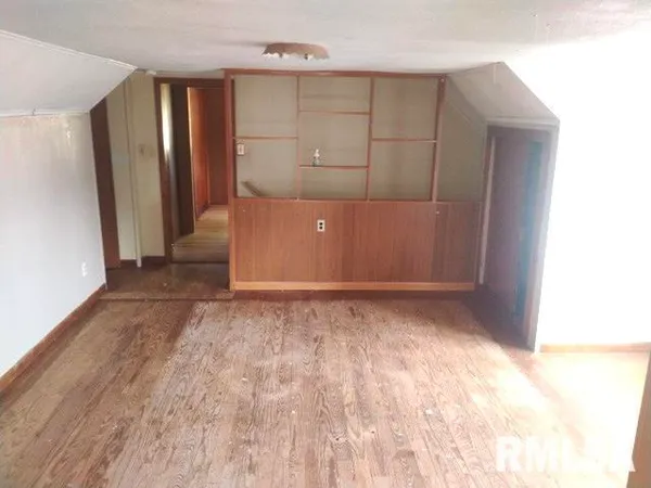a view of a room with a window