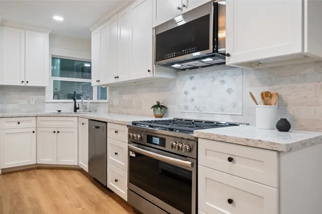 a bed room with a bed and wooden floor