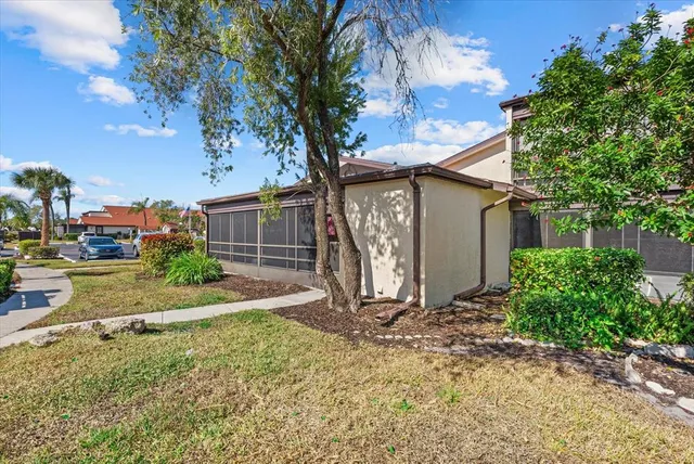 a view of parking garage with cars