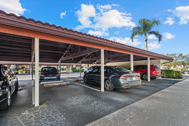 a backyard of a house with sofas