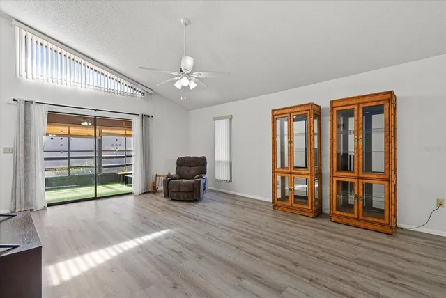 a view of livingroom with furniture wooden floor and window
