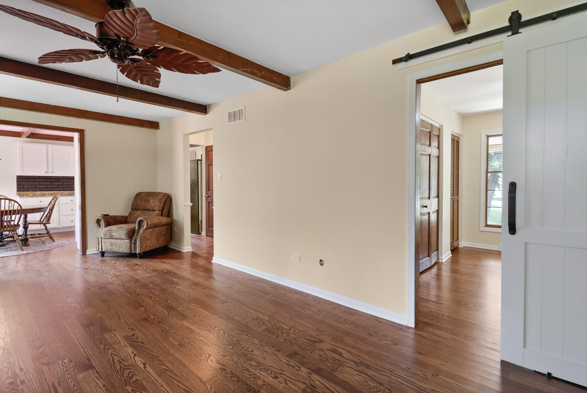 8670 Howard Street St. John, IN 46373 - Photo 13 of 34 a view of a room with wooden floor and furniture