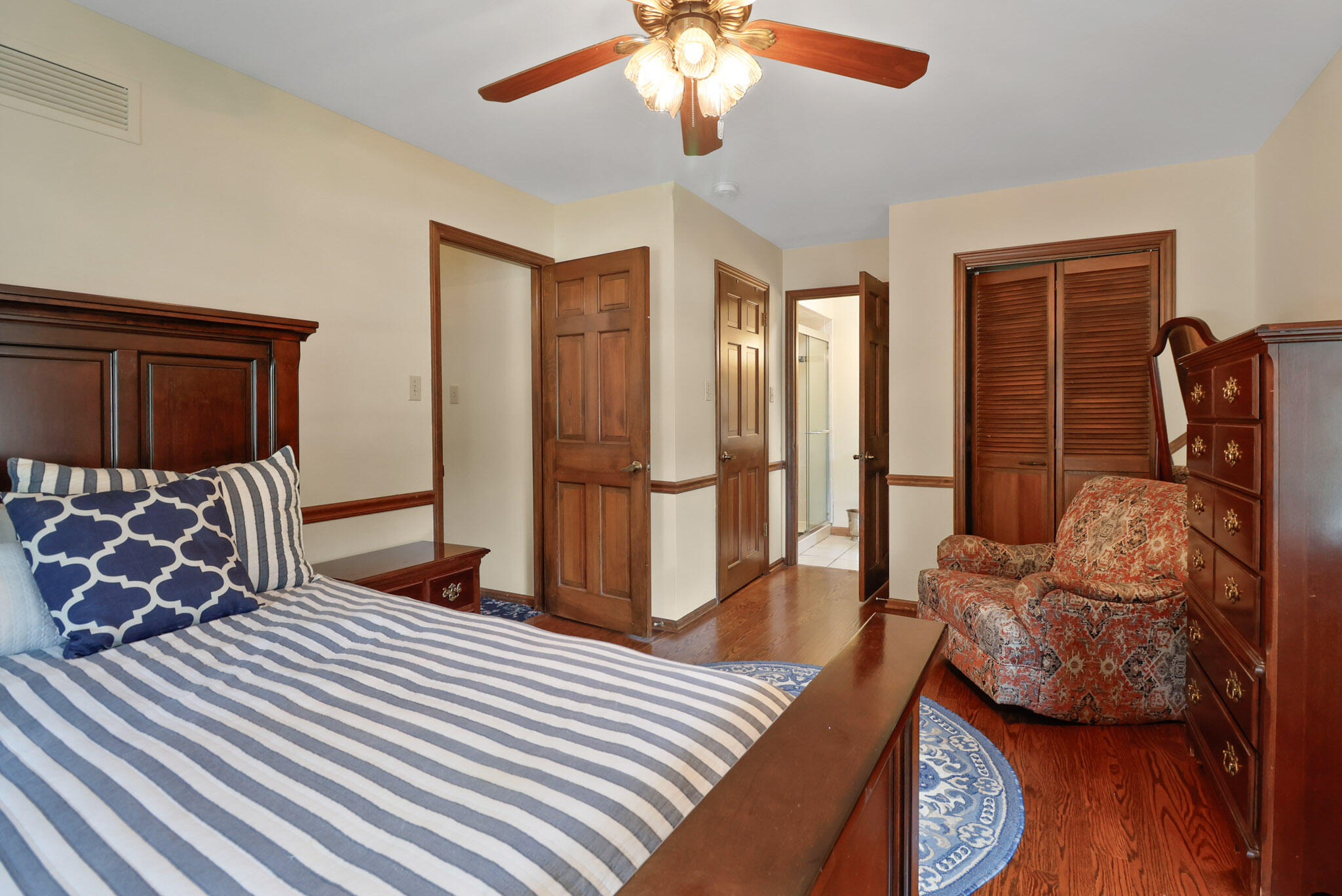 8670 Howard Street St. John, IN 46373 - Photo 17 of 34 a bedroom with furniture and wooden floor