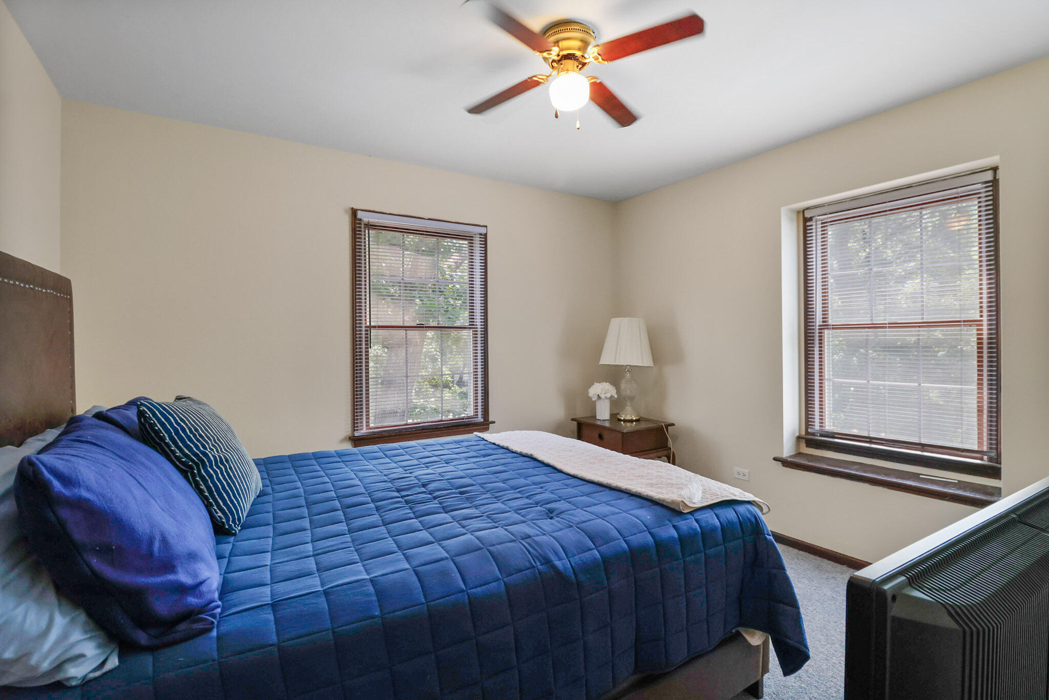 8670 Howard Street St. John, IN 46373 - Photo 22 of 34 a bedroom with a bed and a window