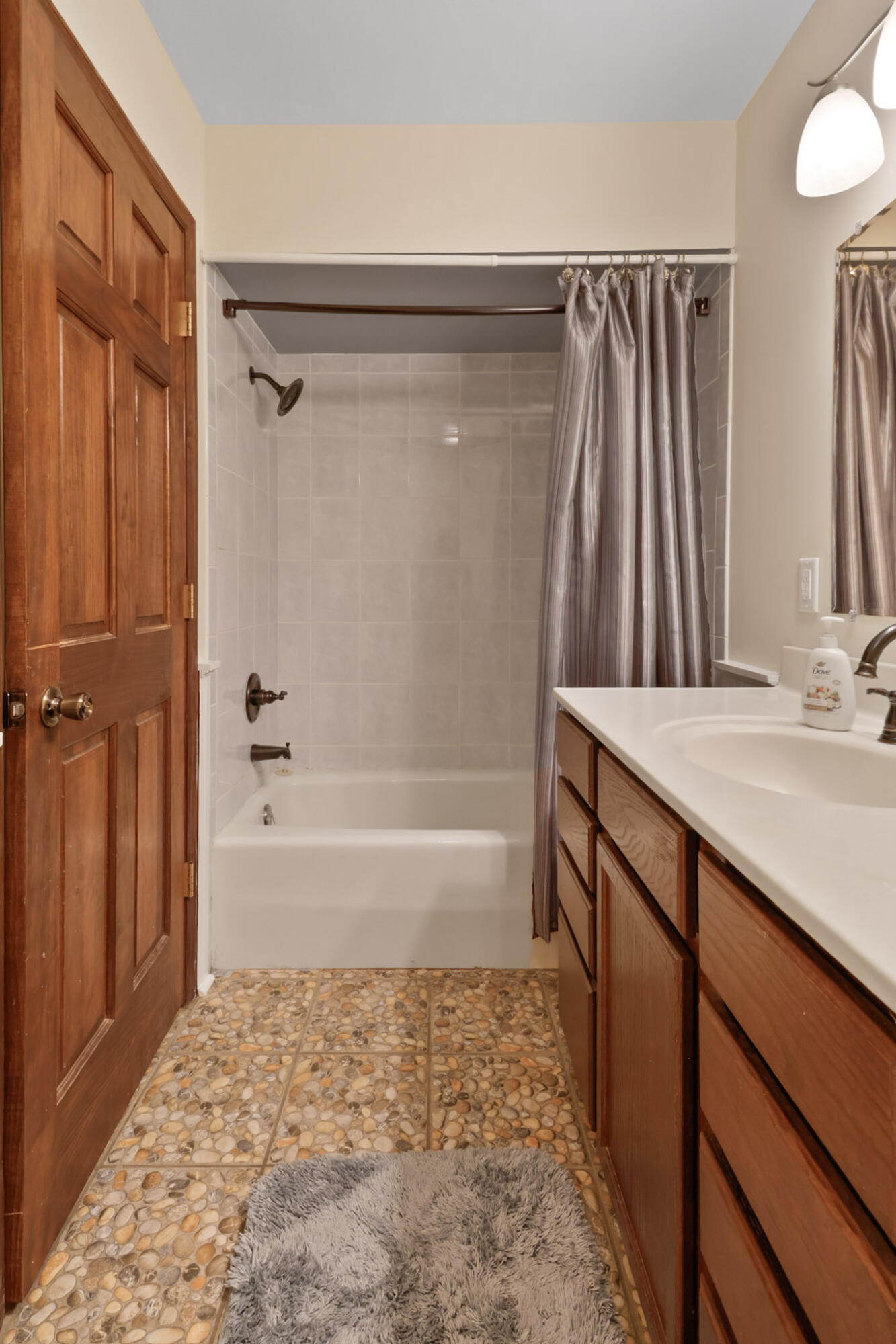 8670 Howard Street St. John, IN 46373 - Photo 23 of 34 a bathroom with a bathtub and a shower