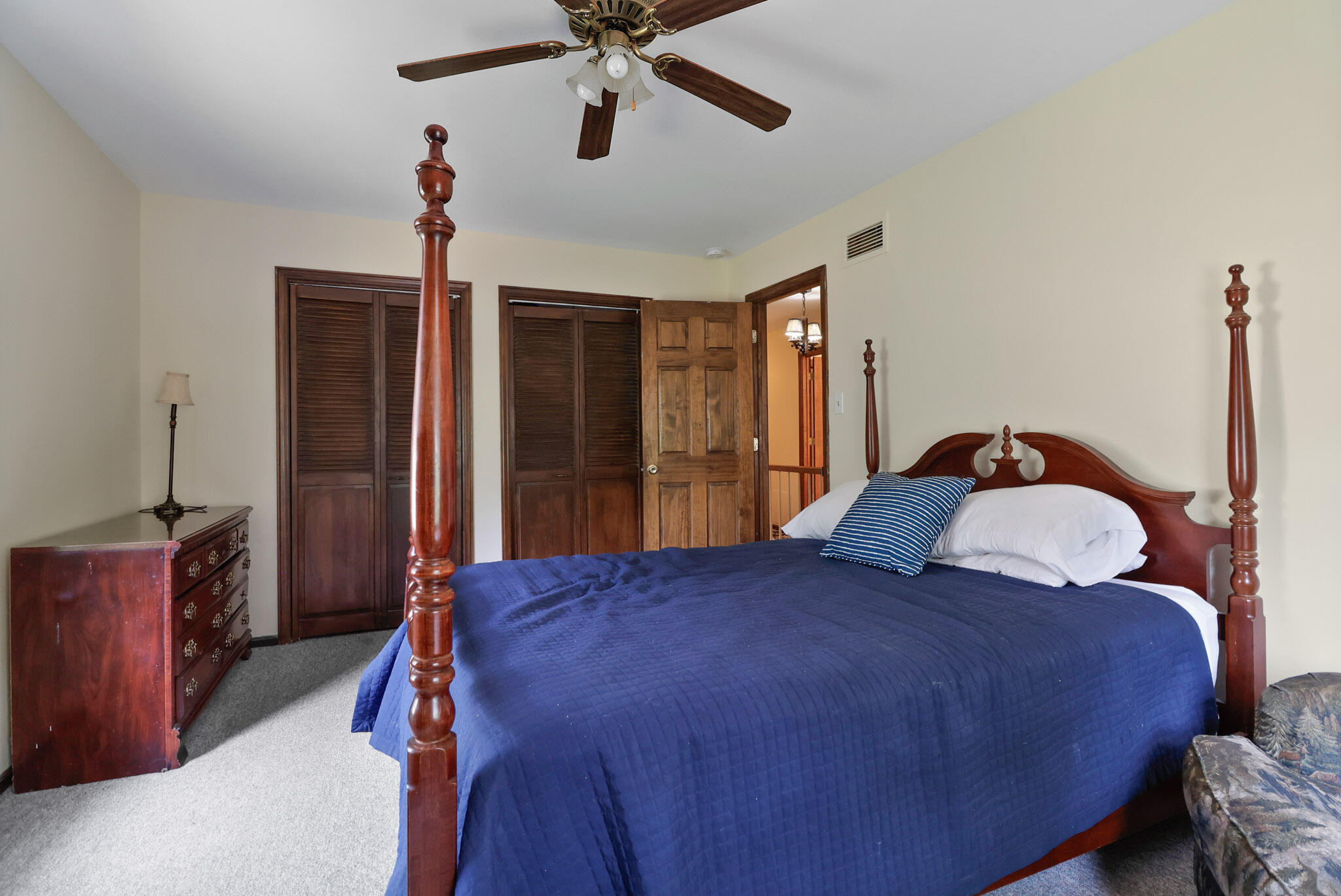 8670 Howard Street St. John, IN 46373 - Photo 25 of 34 a bedroom with a bed and a dresser