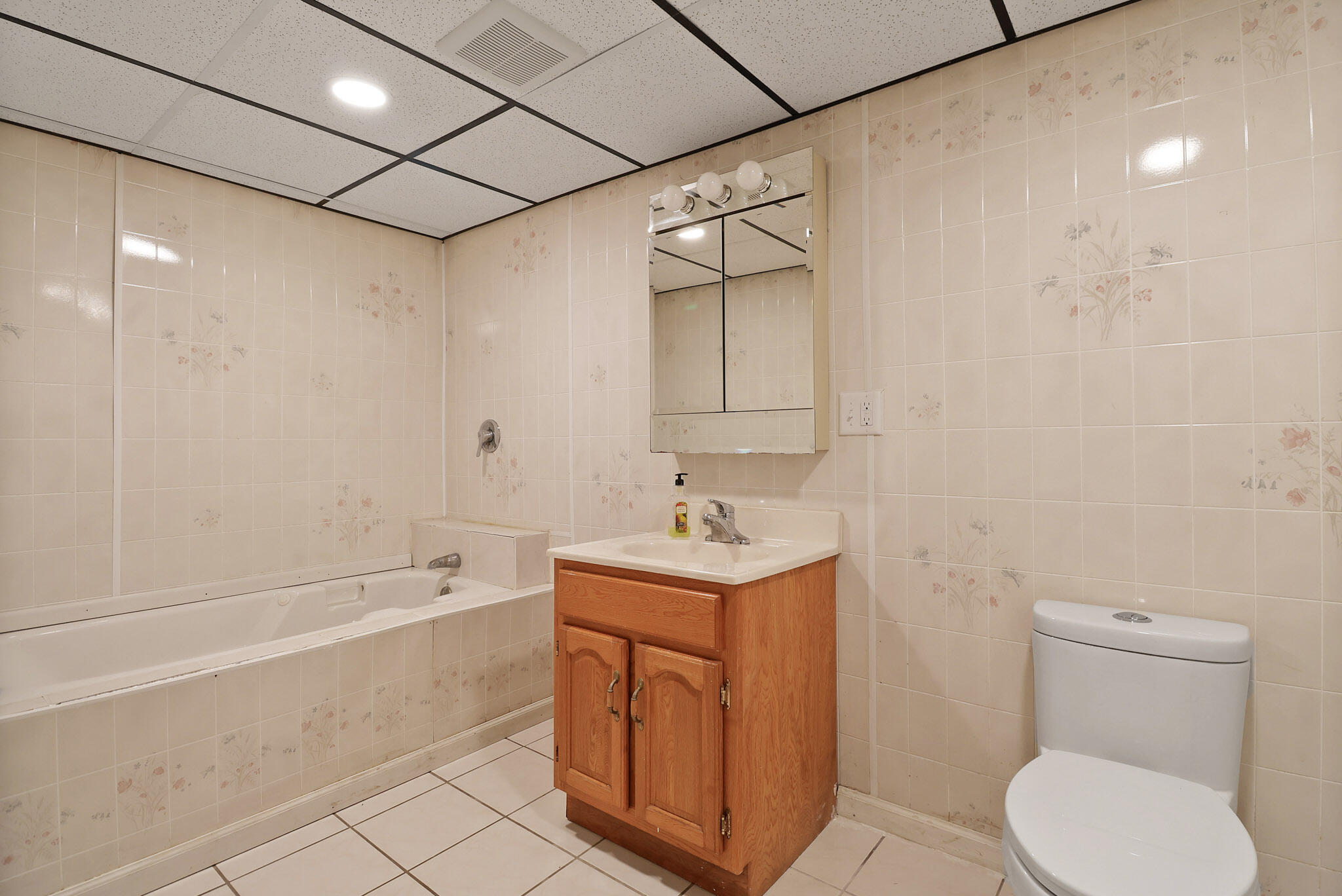 8670 Howard Street St. John, IN 46373 - Photo 29 of 34 a bathroom with a sink a toilet and shower
