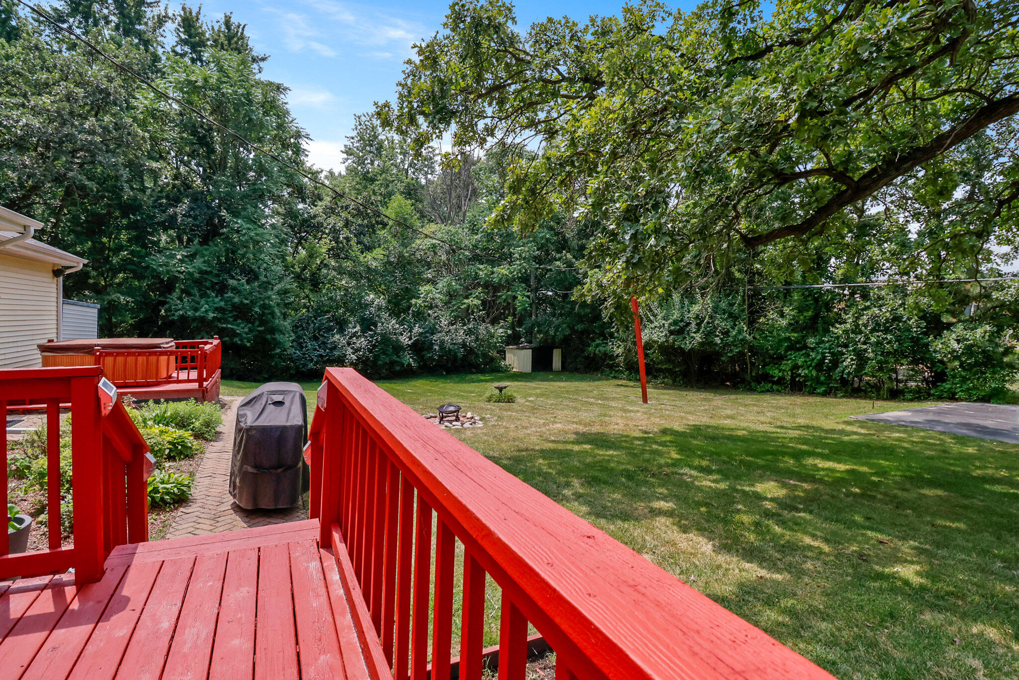 8670 Howard Street St. John, IN 46373 - Photo 32 of 34 a view of a wooden deck with a yard