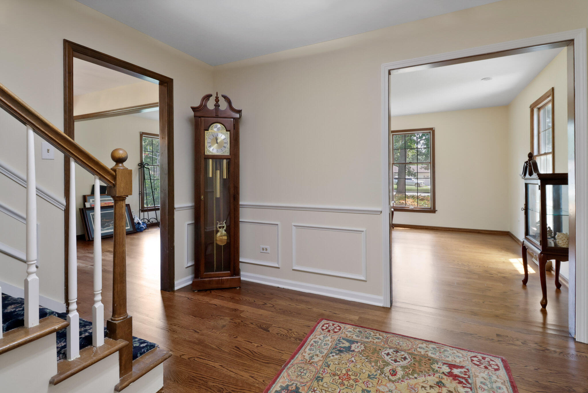 8670 Howard Street St. John, IN 46373 - Photo 4 of 34 a view of an entryway with wooden floor and windows