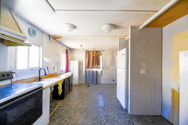 a large bathroom with a double vanity sink and a mirror
