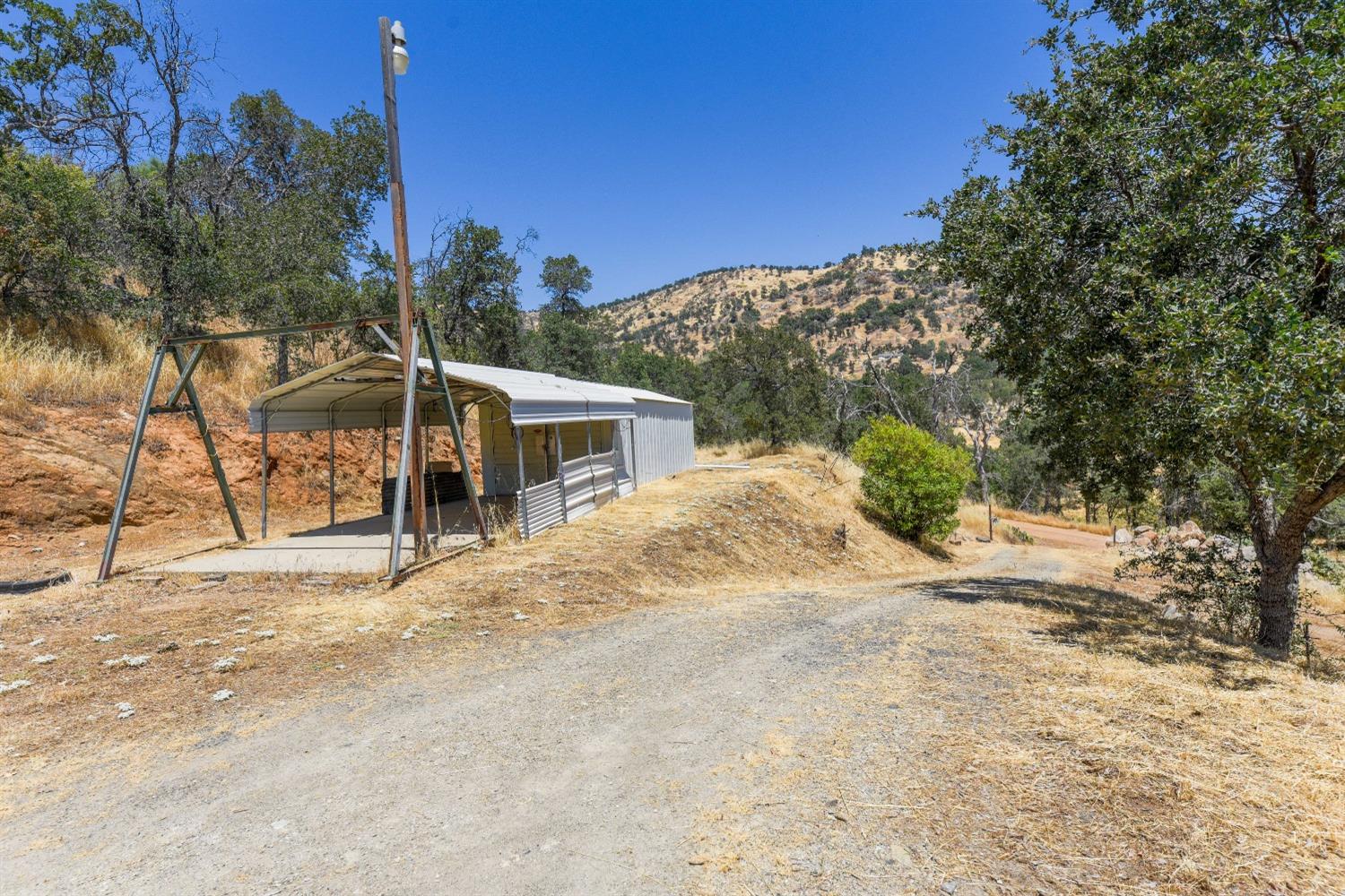 3101 Trower Road Catheys Valley, CA 95306 - Photo 22 of 29 a view of a house with a outdoor space