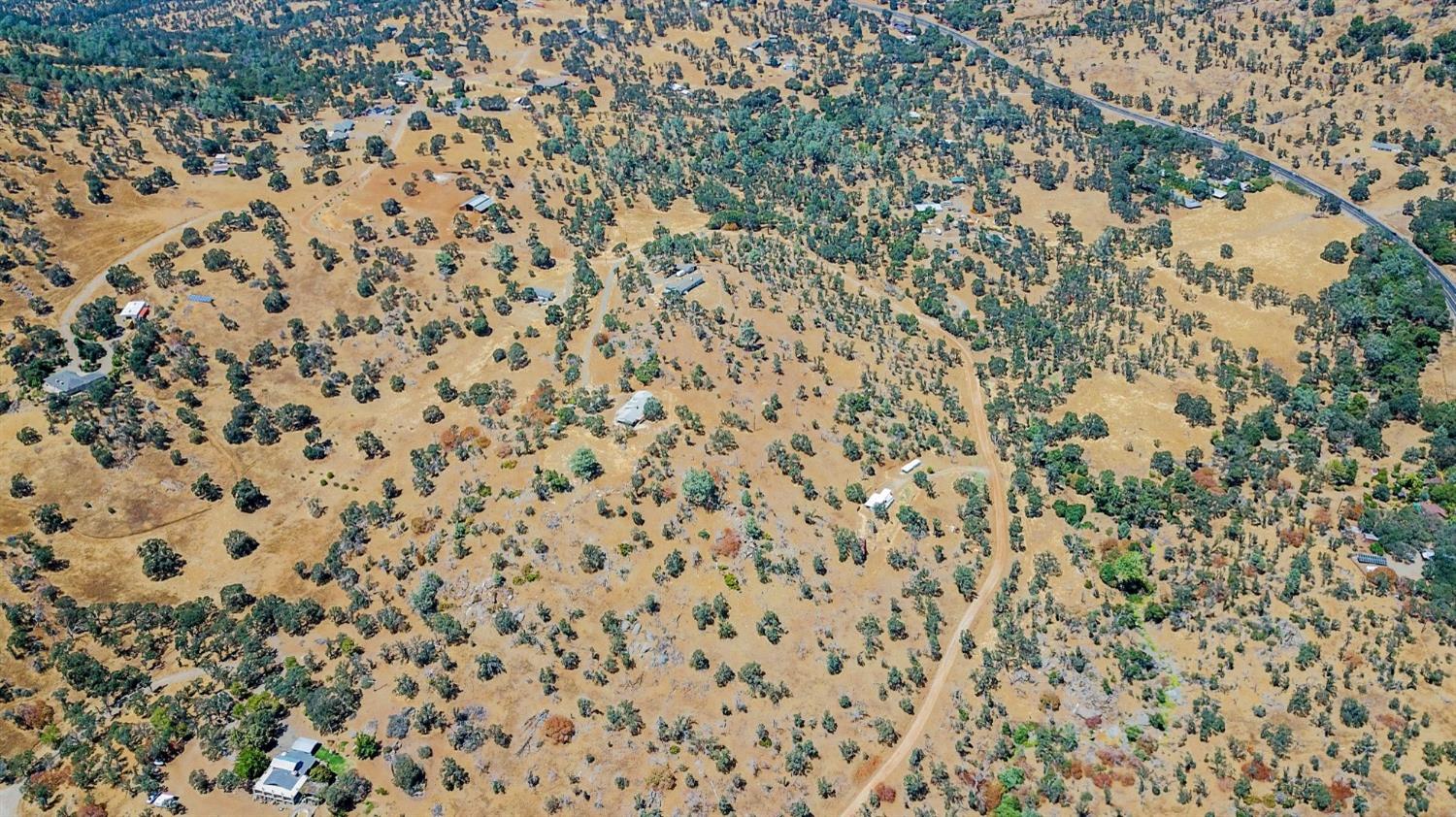 3101 Trower Road Catheys Valley, CA 95306 - Photo 27 of 29 a bathroom with a shower curtain