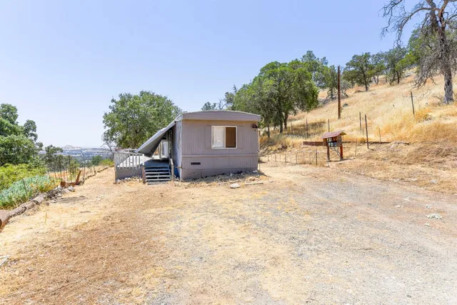 a view of a house with a patio