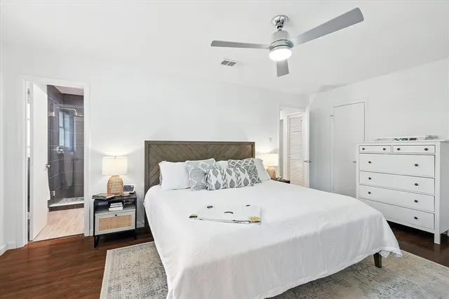 a large white bed in a white room