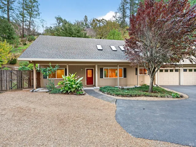 front view of a house with a yard
