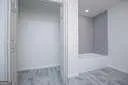 a bathroom with a glass shower door