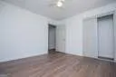 a view of a big room with windows