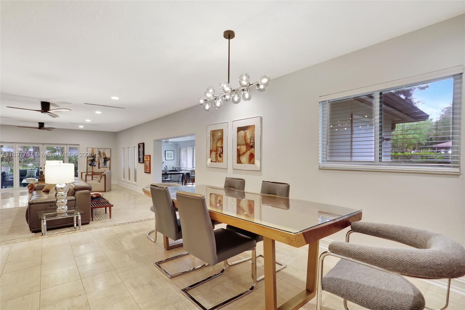 1128 West Cypress Drive, Unit V15 Pompano Beach, FL 33069 - Photo 23 of 41 a view of a dining room with furniture