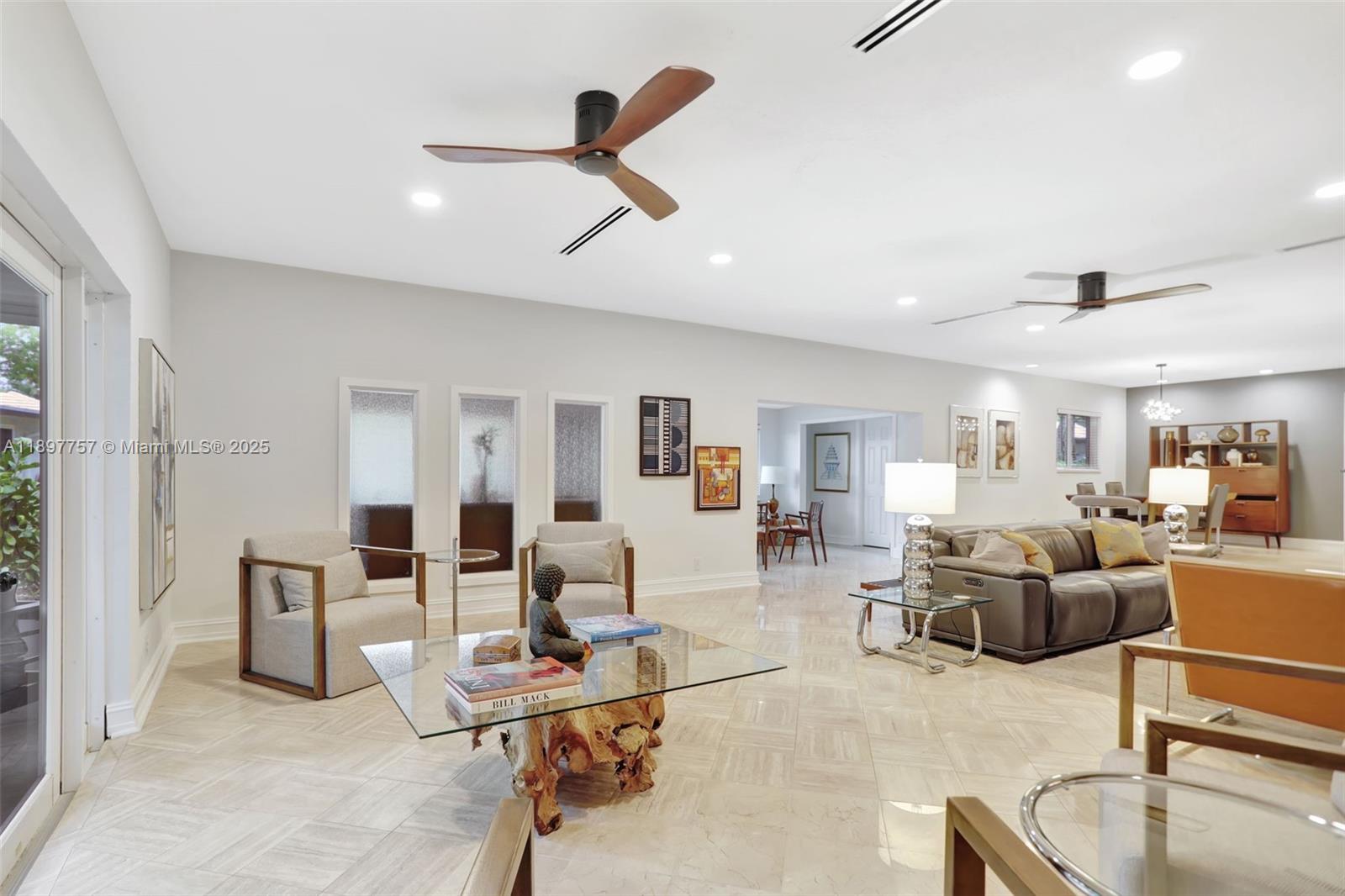 1128 West Cypress Drive, Unit V15 Pompano Beach, FL 33069 - Photo 30 of 41 a living room with furniture