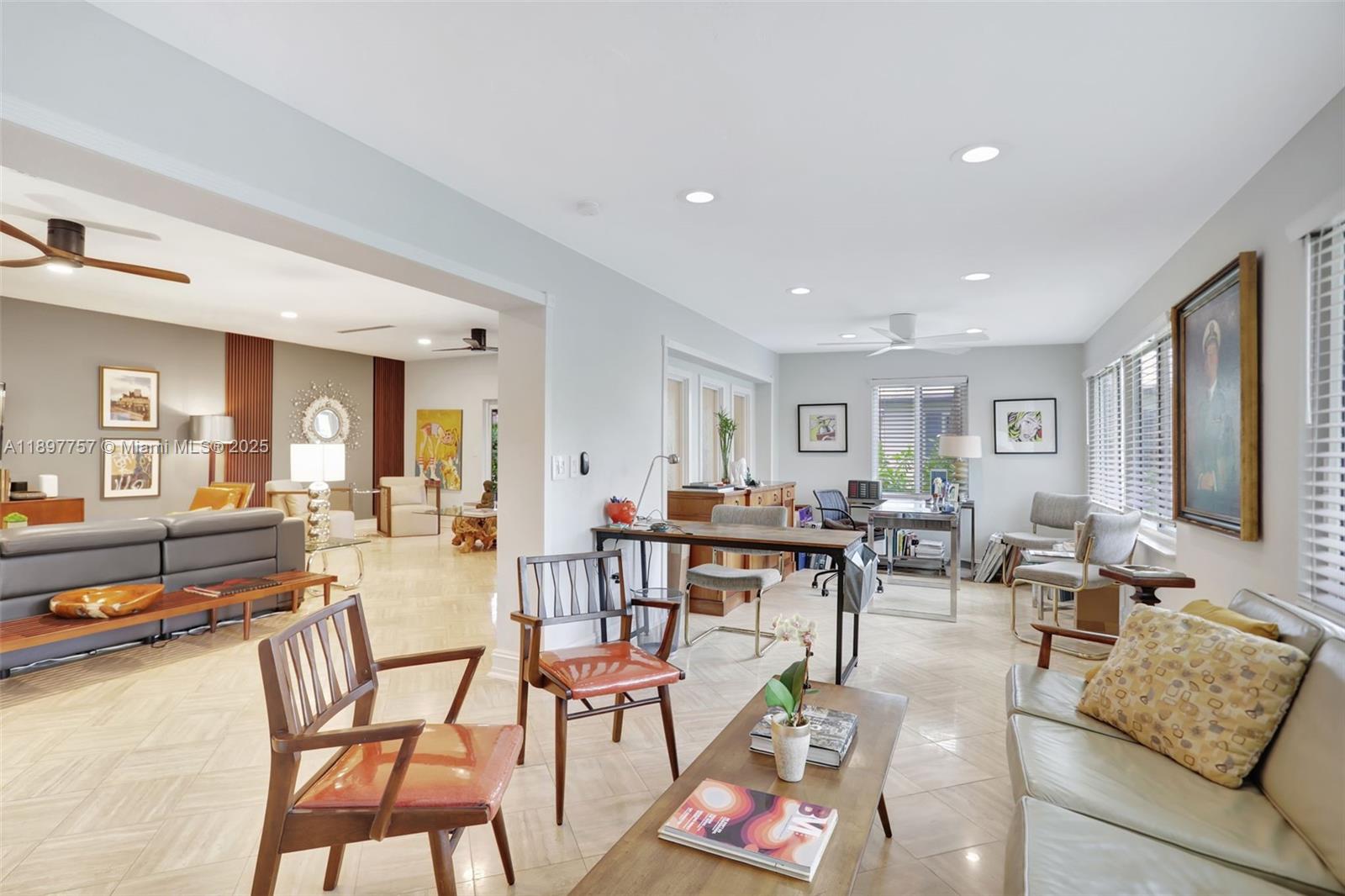 1128 West Cypress Drive, Unit V15 Pompano Beach, FL 33069 - Photo 33 of 41 a living room with lots of furniture and view of kitchen