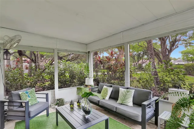 a outdoor living space with furniture and garden view