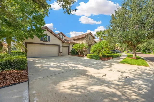 a kitchen with a sink and large window