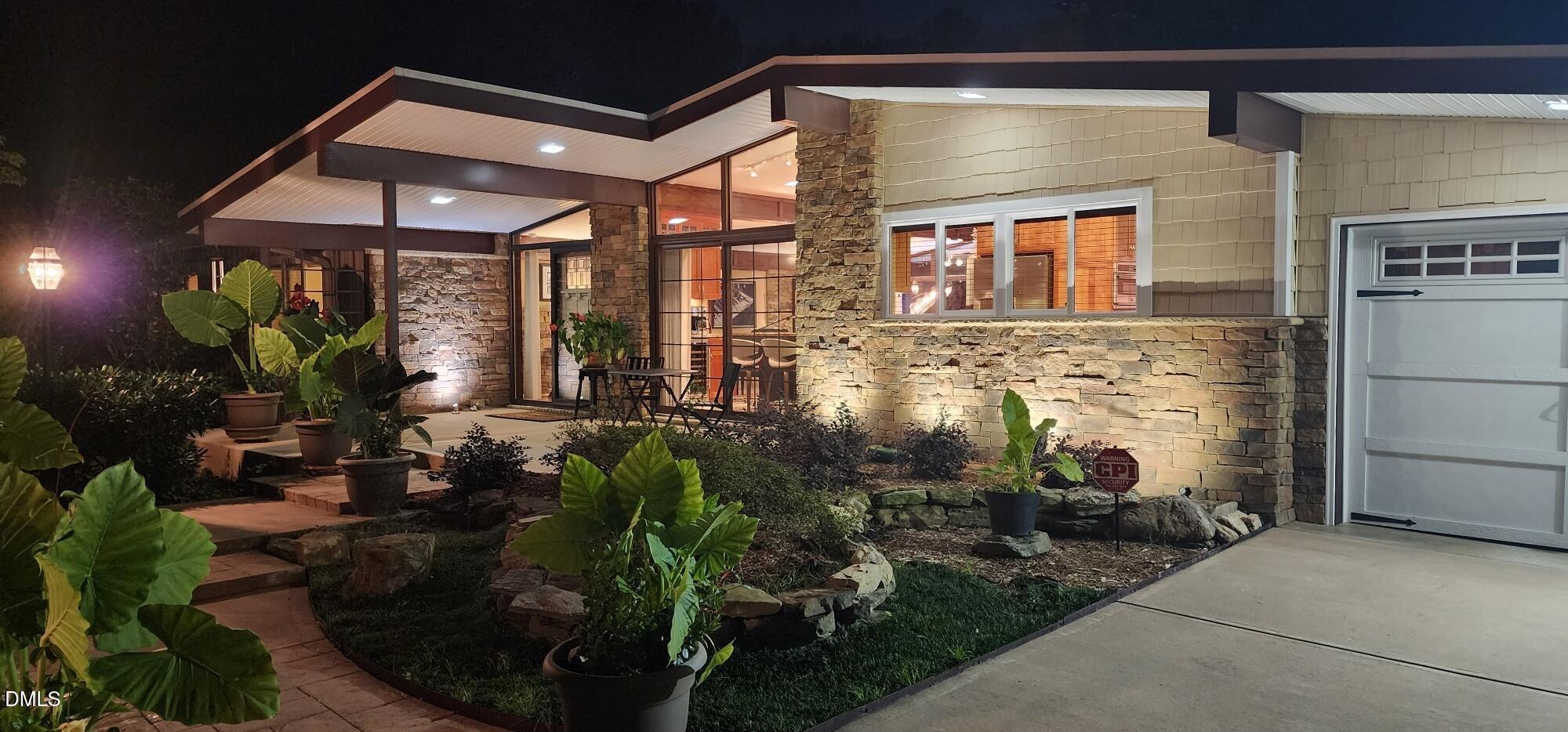 5219 Coronado Drive Raleigh, NC 27609 - Photo 12 of 100 Evening front of house 20250724_212219_r