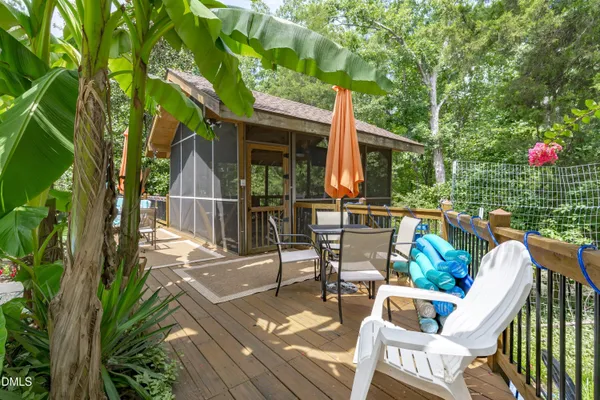 a large kitchen with stainless steel appliances granite countertop a refrigerator and a sink