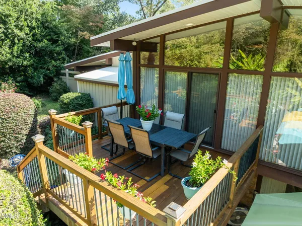 a bedroom with a bed couch and window