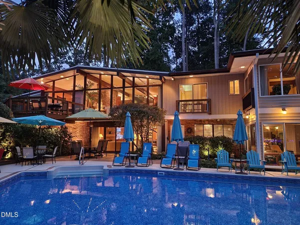 a spacious bathroom with a double vanity sink mirror and shower