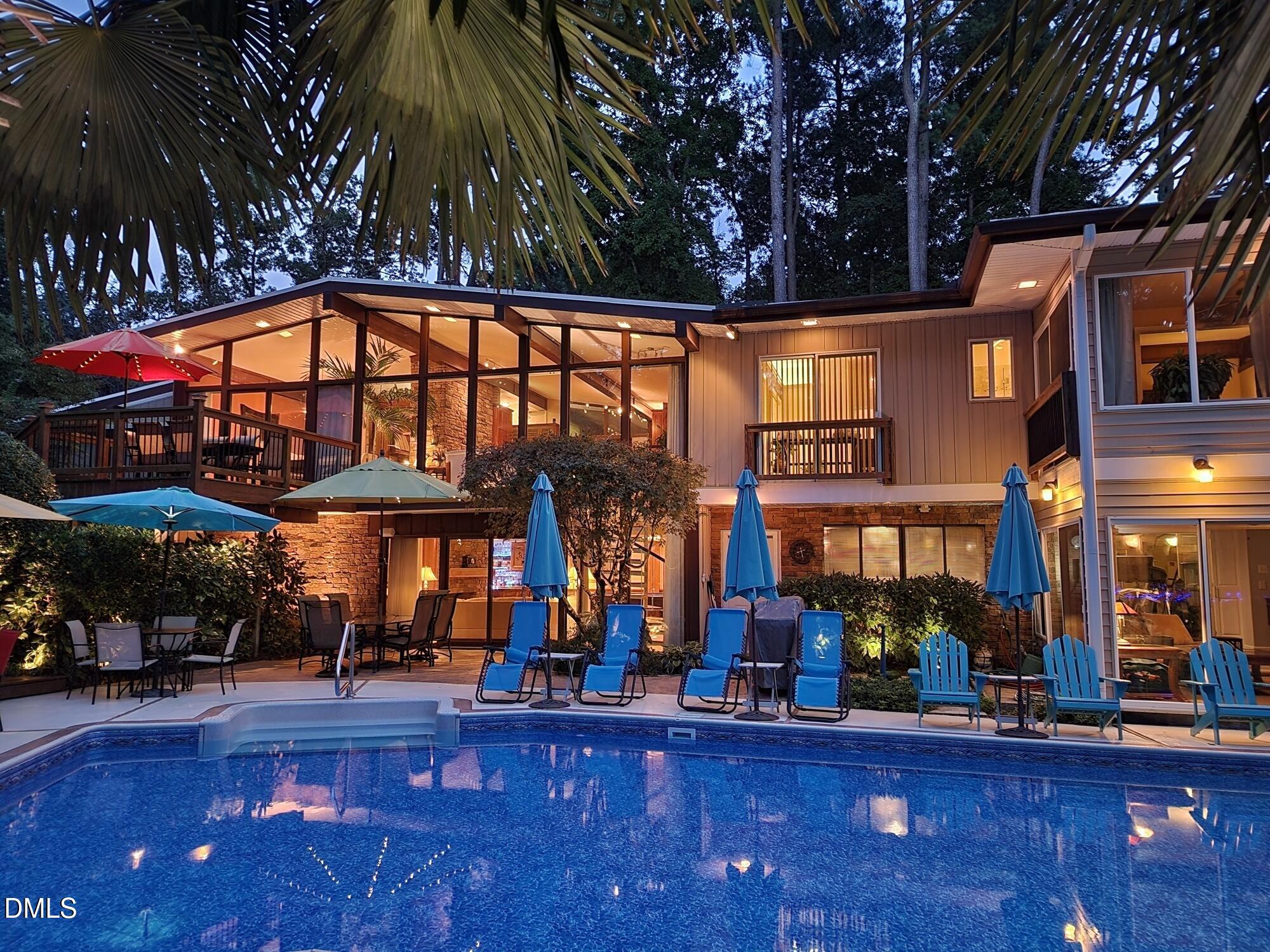 5219 Coronado Drive Raleigh, NC 27609 - Photo 38 of 100 Night time back of house and pool 202207