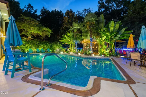 a living room with fireplace furniture and a fireplace