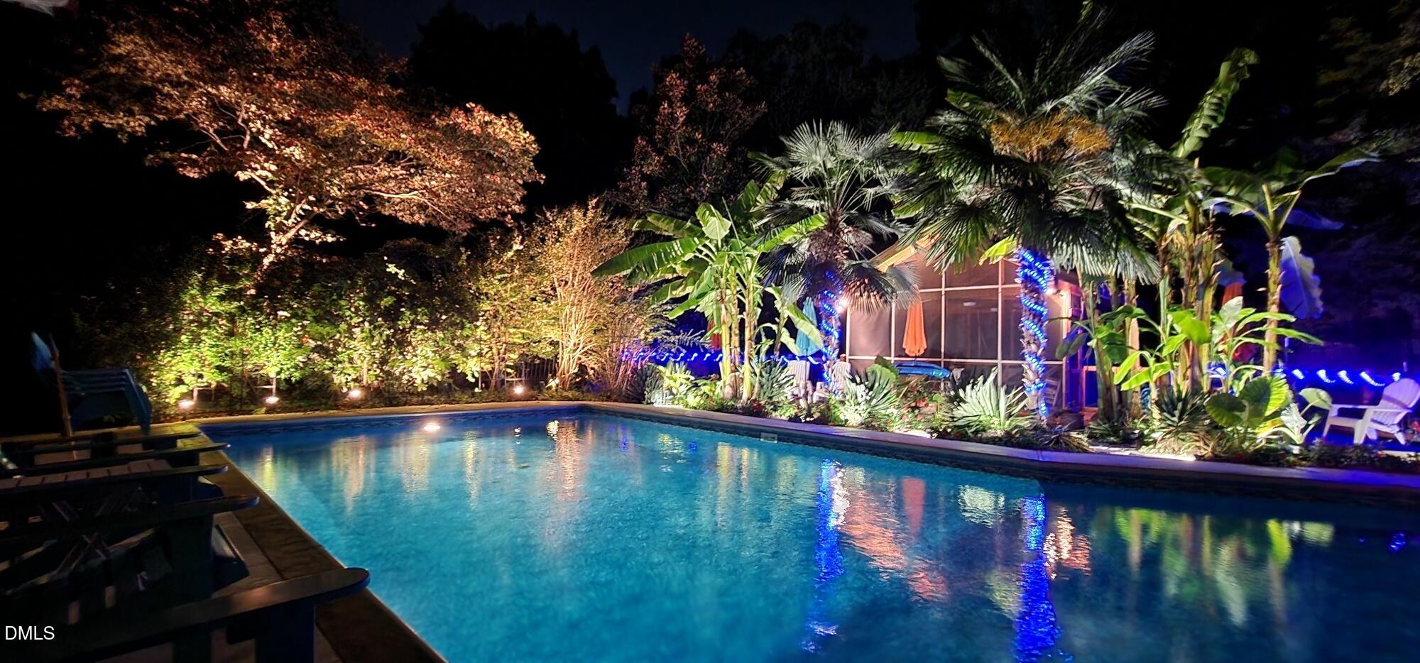 5219 Coronado Drive Raleigh, NC 27609 - Photo 46 of 100 Evening lights and pool 20221007_195007_