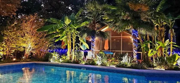a bathroom with a sink vanity and a mirror