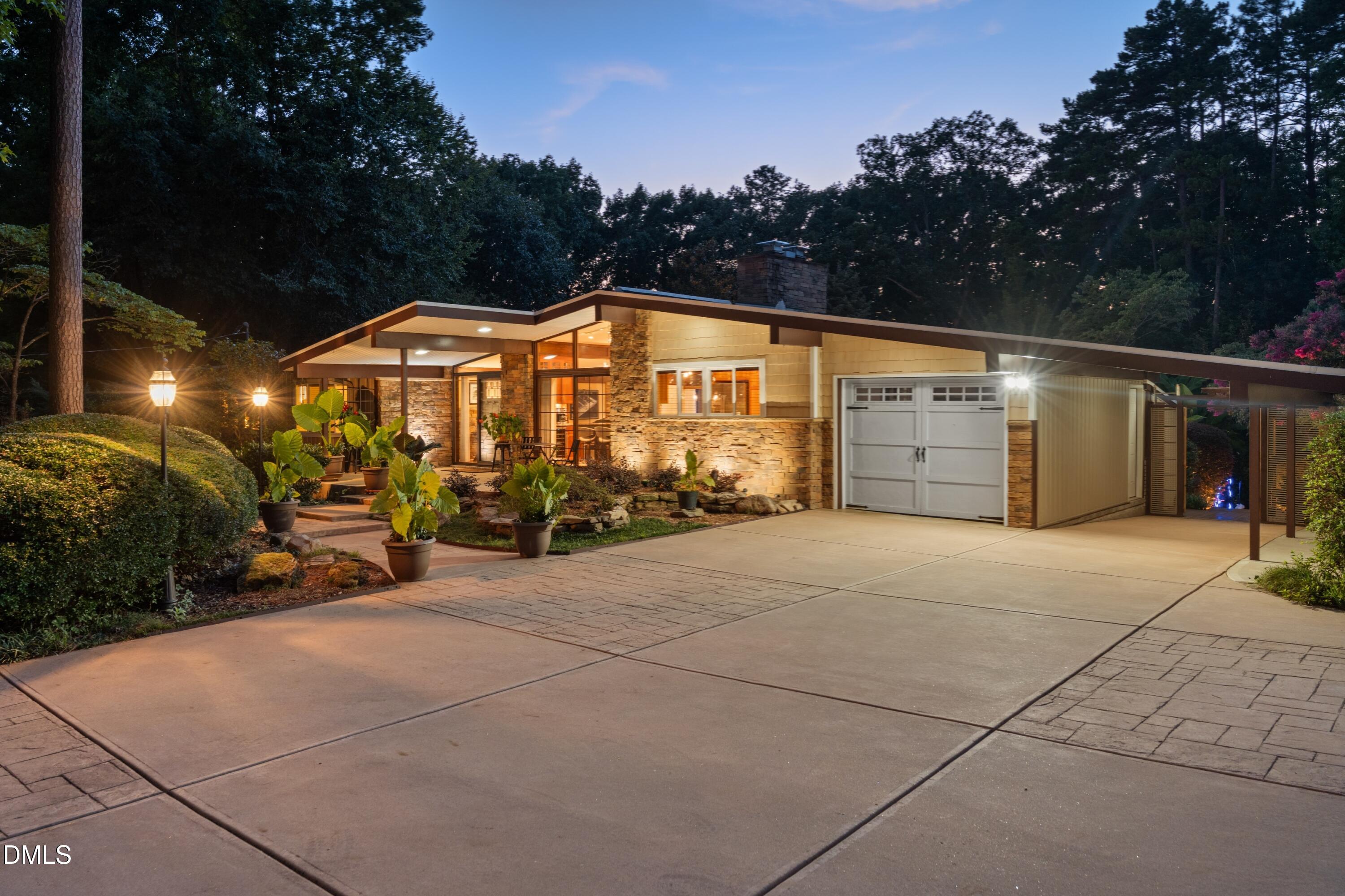 5219 Coronado Drive Raleigh, NC 27609 - Photo 10 of 100 Evening front with lights 3_resized_1