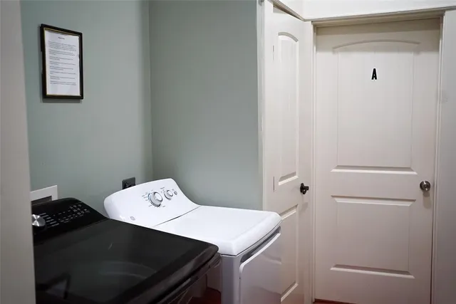 a view of a door and a window