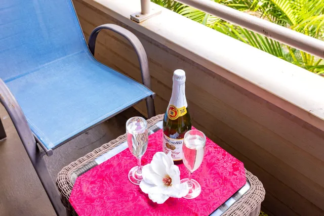 a kitchen with stainless steel appliances granite countertop a sink stove microwave and refrigerator