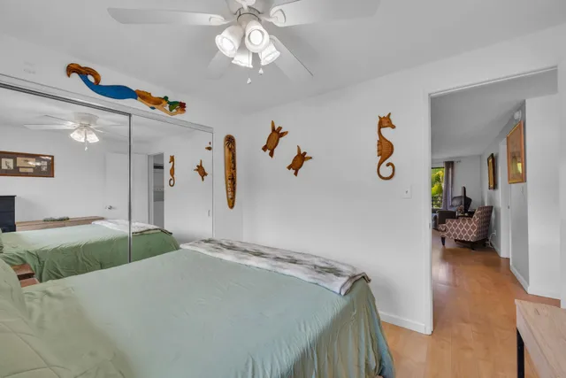 a bathroom with a toilet and a shower curtain