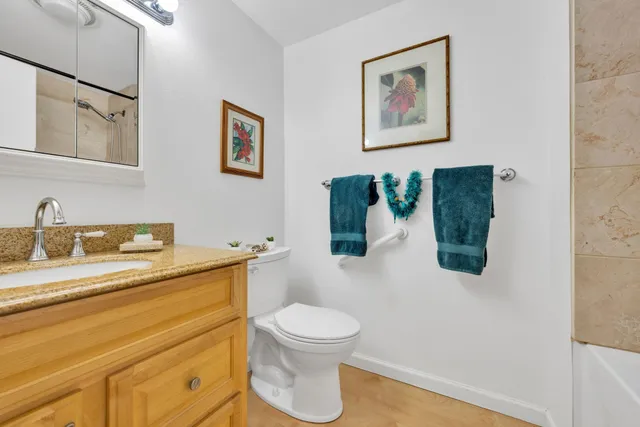 a bathroom with a bathtub and shower