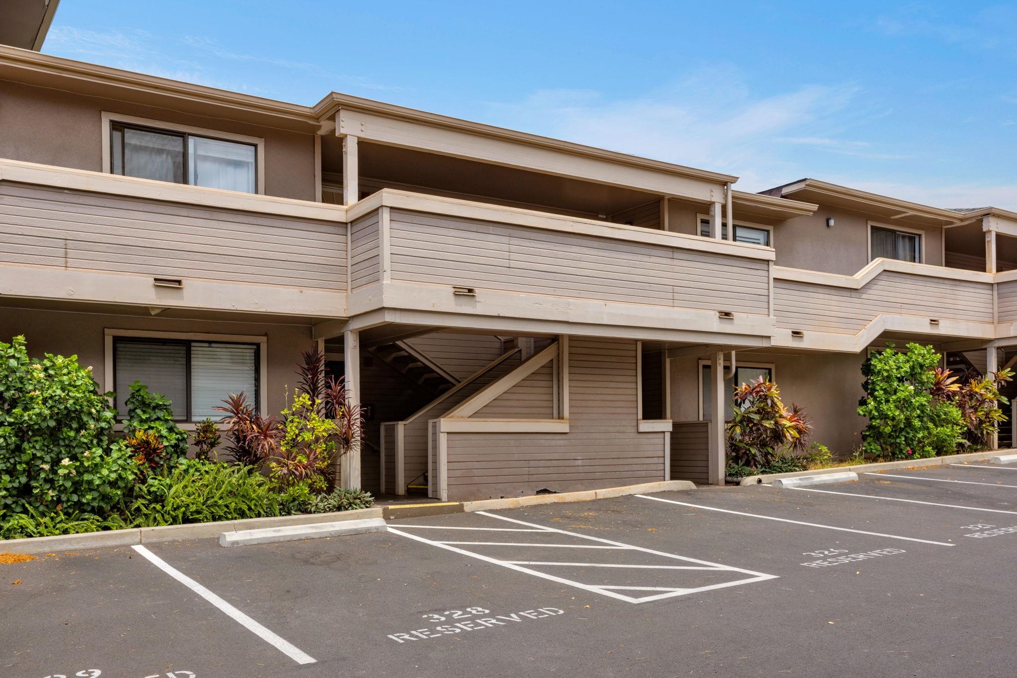 2747 South Kihei Road, Unit C205 Kihei, HI 96753 - Photo 31 of 49 a front view of a house with a garden