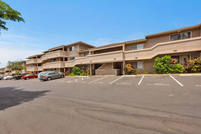 a view of a street with cars