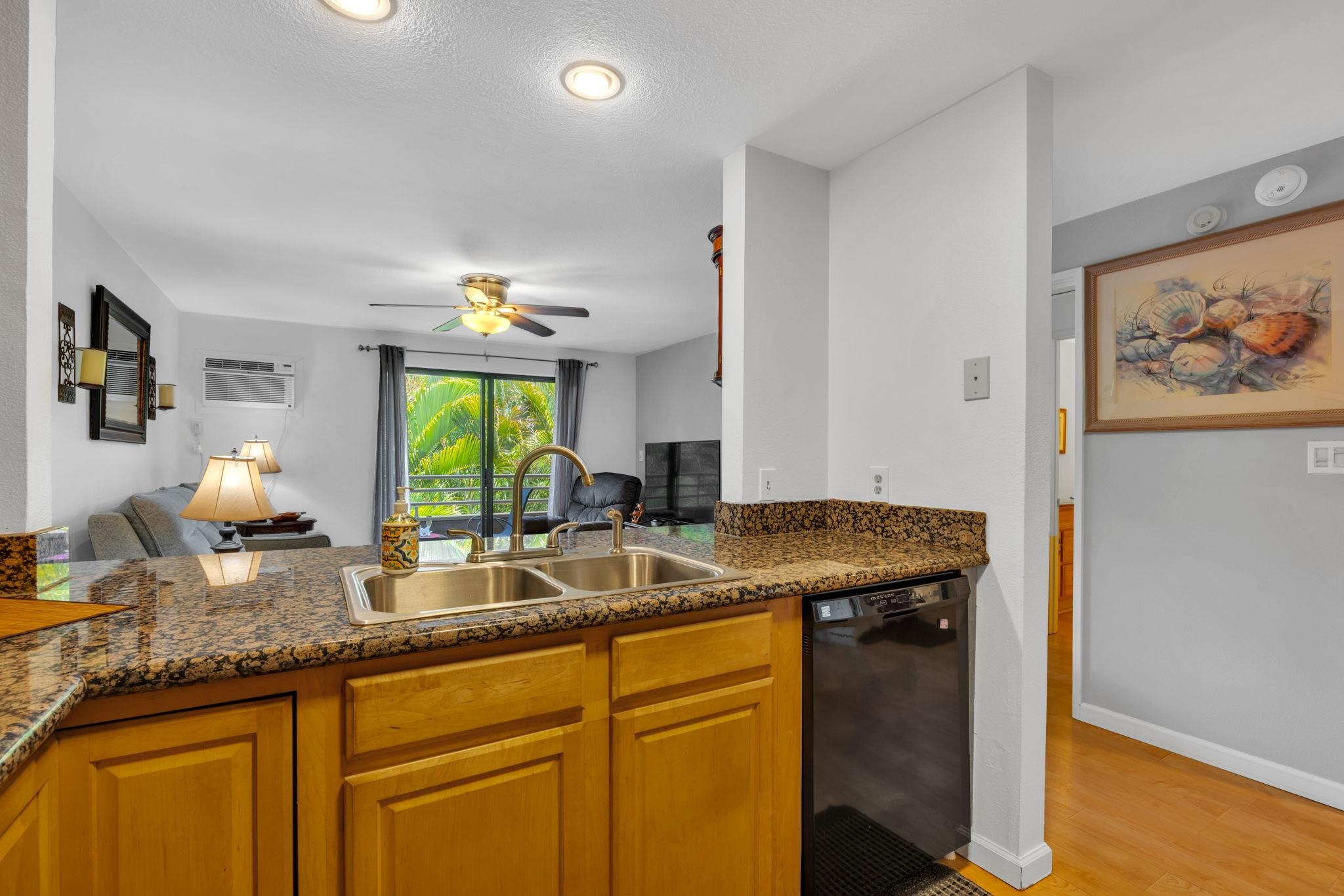 2747 South Kihei Road, Unit C205 Kihei, HI 96753 - Photo 7 of 49 a kitchen with sink and window