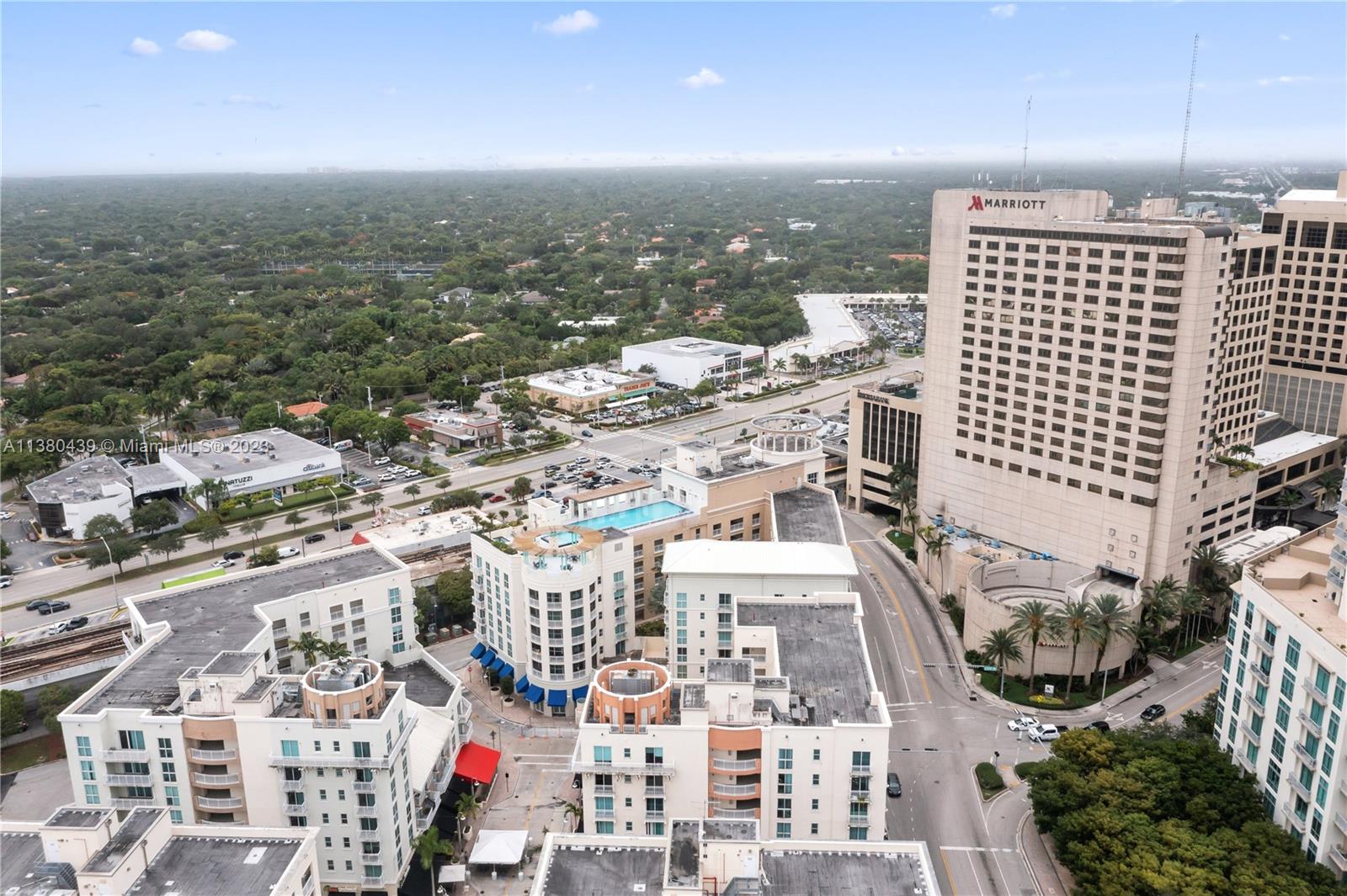 7290 Southwest 90th Street, Unit F606 Miami, FL 33156 - Photo 16 of 17 an aerial view of a city