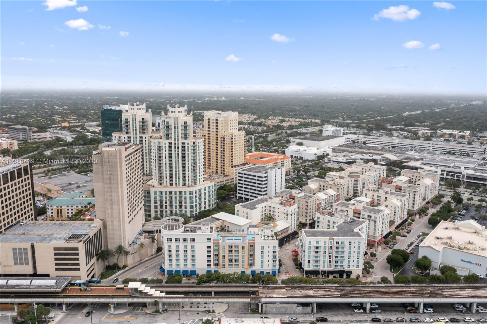 7290 Southwest 90th Street, Unit F606 Miami, FL 33156 - Photo 17 of 17 an aerial view of a city