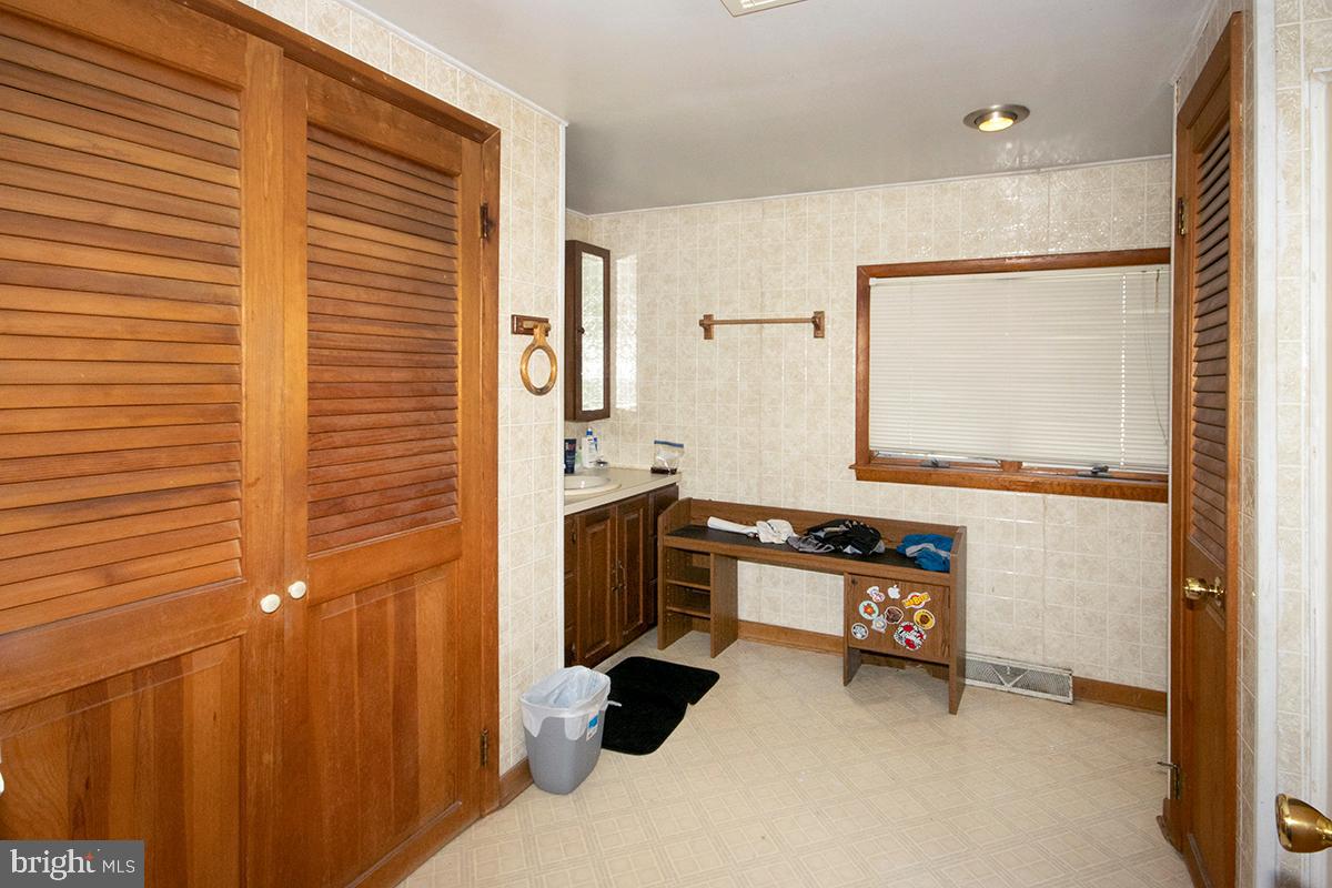 8 Franklin Road Glassboro, NJ 08028 - Photo 12 of 40 a kitchen with a sink and a refrigerator