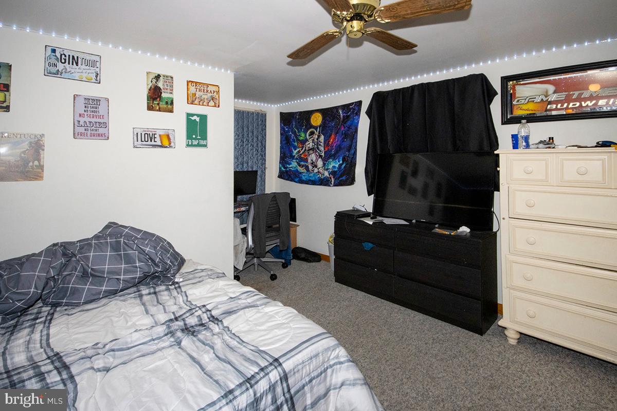 8 Franklin Road Glassboro, NJ 08028 - Photo 13 of 40 a bedroom with a bed and a television