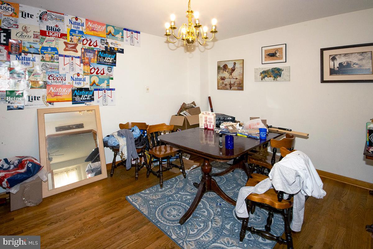 8 Franklin Road Glassboro, NJ 08028 - Photo 19 of 40 a view of a dining room with furniture and wooden floor