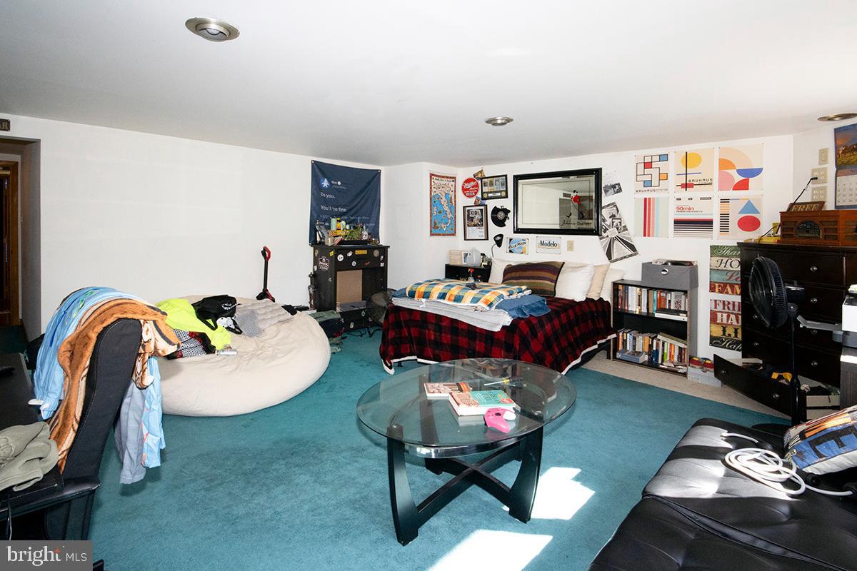 8 Franklin Road Glassboro, NJ 08028 - Photo 26 of 40 a living room with furniture fireplace and a window