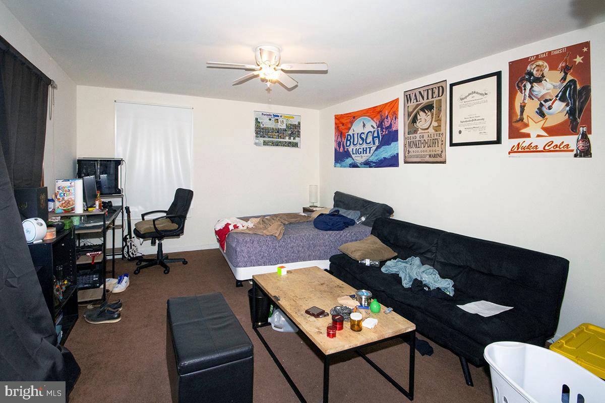 8 Franklin Road Glassboro, NJ 08028 - Photo 29 of 40 a living room with furniture and wooden floor